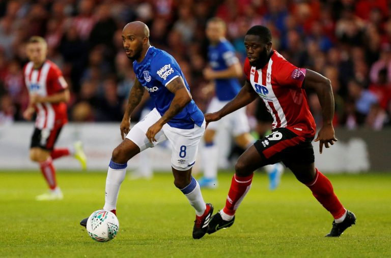 Everton's Fabian Delph in action with Lincoln City's John Akinde