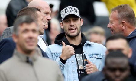 Newcastle United's Andy Carroll in the stands before the Arsenal match