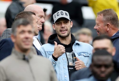 Newcastle United's Andy Carroll in the stands before the Arsenal match
