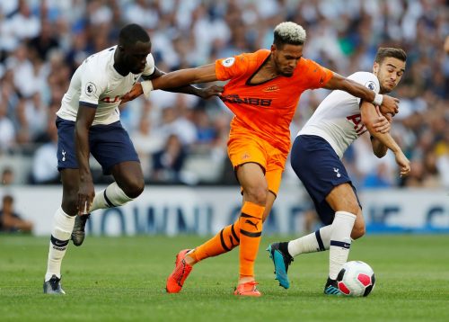 Newcastle United's Joelinton in action with Tottenham Hotspur's Harry Winks and Davinson Sanchez August, 2019