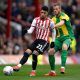 Brentford's Said Benrahma in action with West Bromwich Albion's Chris Brunt