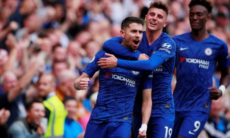 Chelsea's Jorginho celebrates scoring their first goal v Brighton & Hove Albion with teammate Mason Mount