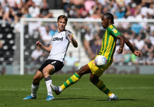 Derby County's Kieran Dowell in action with West Bromwich Albion's Romaine Sawyers