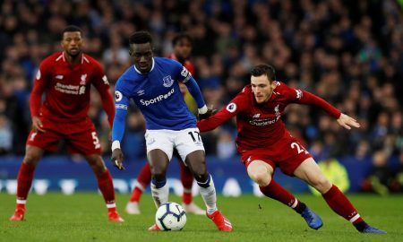 Everton's Idrissa Gueye in action with Liverpool's Andrew Robertson