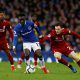 Everton's Idrissa Gueye in action with Liverpool's Andrew Robertson