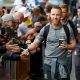 Leeds United's Adam Forshaw interacts with fans after arriving at Elland Road before the Swansea match, Aug 2019
