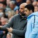 Manchester City manager Pep Guardiola with assistant coach Mikel Arteta