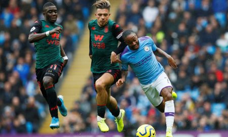 Aston Villa's Jack Grealish and Marvelous Nakamba in action with Manchester City's Raheem Sterling