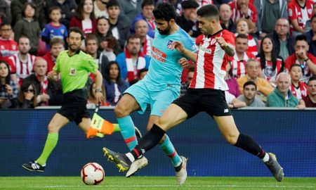 Atletico Madrid's Diego Costa in action with Athletic Bilbao's Unai Nunez