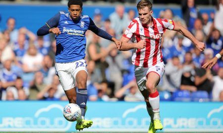 Birmingham City's Jude Bellingham in action with Stoke City's Liam Lindsay