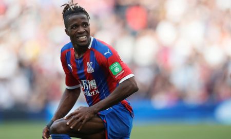 Crystal Palace's Wilfried Zaha looks on at Tottenham Hotspur