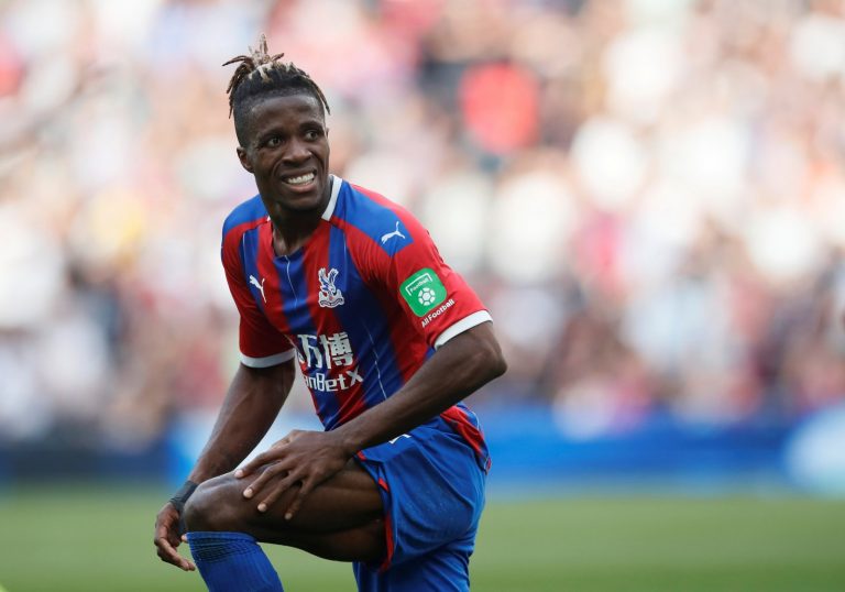 Crystal Palace's Wilfried Zaha looks on at Tottenham Hotspur