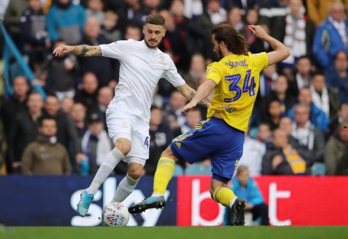 Leeds United's Mateusz Klich in action with Birmingham City's Ivan Sunjic Action
