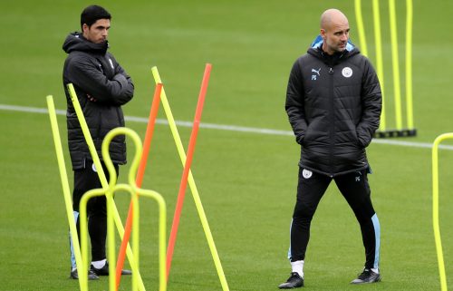 Manchester City manager Pep Guardiola and assistant manager Mikel Arteta during training