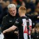 Newcastle United manager Steve Bruce celebrates with Matthew Longstaff after the Manchester United match.JPG