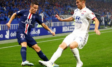 Paris St Germain's Ander Herrera in action with Olympique Lyonnais' Joachim Andersen