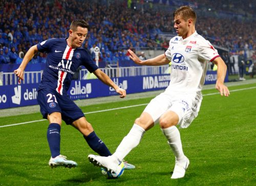 Paris St Germain's Ander Herrera in action with Olympique Lyonnais' Joachim Andersen