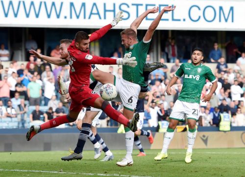 Sheffield Wednesday's Jordan Rhodes in action with Millwall's Bartosz Bialkowski