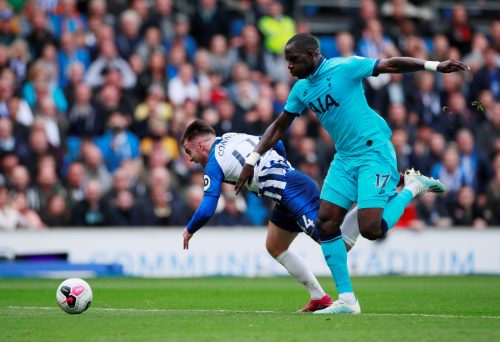 Tottenham Hotspur's Moussa Sissoko in action with Brighton and Hove Albion's Aaron Connolly