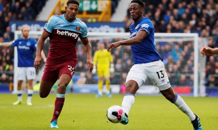 West Ham United's Sebastien Haller in action with Everton's Yerry Mina