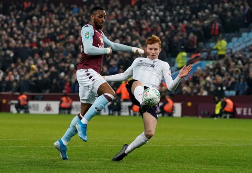 Van den Berg in League Cup action vs Aston Villa