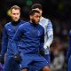 Tanganga warms up before Liverpool clash