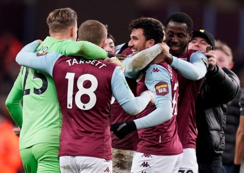 Villa players celebrate late win over Leicester