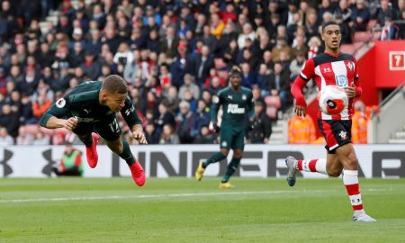 Gayle heads a ball towards goal vs Southampton