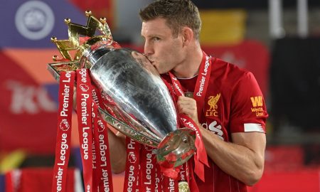 James-milner-celebrates-with-liverpool-premier-league-trophy