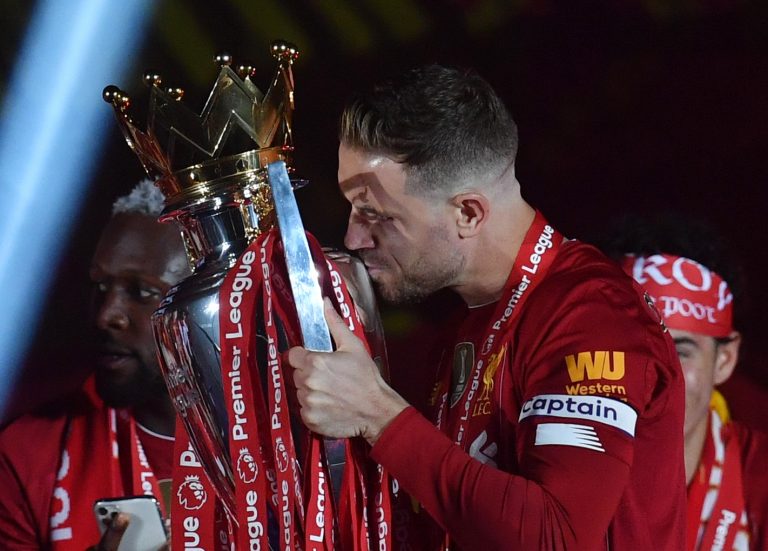Jordan-henderson-lifts-premier-league-trophy-for-liverpool