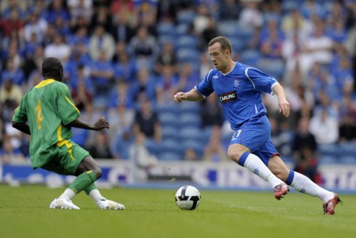 charlie-adam-dribbles-whilst-playing-for-rangers
