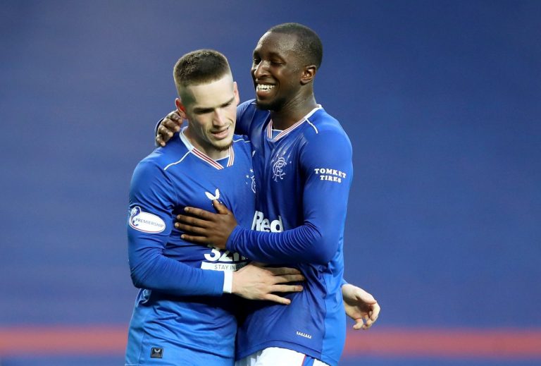 Glen Kamara celebrates with Ryan Kent
