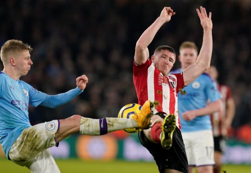 john-lundstram-battles-for-the-ball-vs-manchester-city