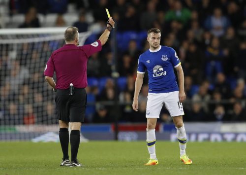 tom-cleverley-receives-a-yellow-card