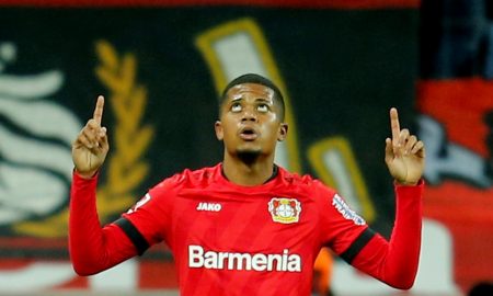 bayer leverkusens leon bailey celebrates scoring against borussia dortmund.