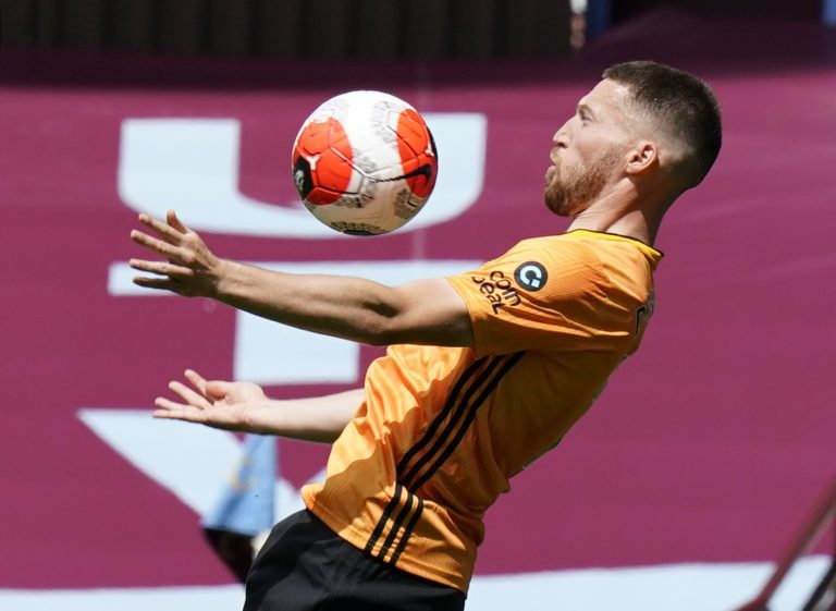 spurs defender matt doherty in action for ex club wolves