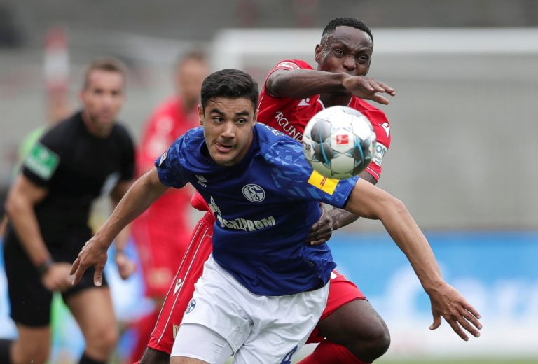 Schalkes-Ozan-Kabak-in-action-with-Union-Berlins-Anthony-Ujah
