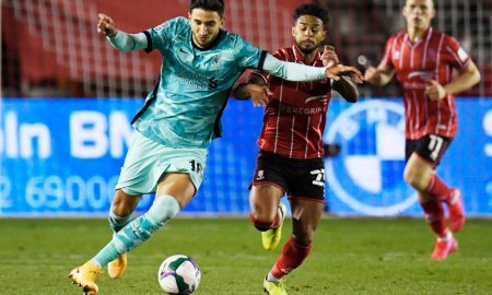 Liverpool's-Marko-Grujic-in-action-with-Lincoln-City's-Liam-Bridcutt