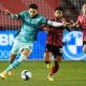 Liverpool's-Marko-Grujic-in-action-with-Lincoln-City's-Liam-Bridcutt