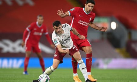 Arsenal's-Granit-Xhaka-in-action-with-Liverpool's-Marko-Grujic