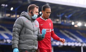 Liverpool's-Virgil-van-Dijk-receives-medical-attention