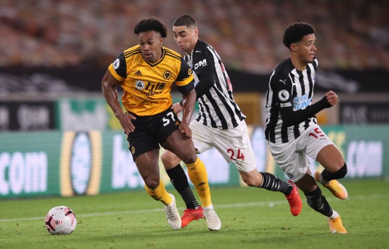 Wolverhampton-Wanderers-Adama-Traore-in-action-with-Newcastle-Uniteds-Jamal-Lewis