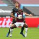 michail antonio tussles for west ham against man city