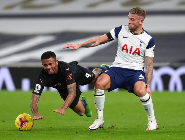 spurs defender toby alderweireld tussles with gabriel jesus against man city