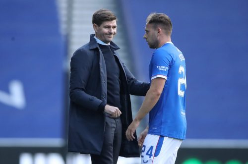 greg stewart in action for rangers as gerrard looks on