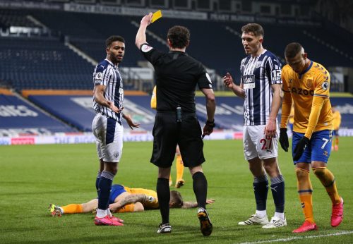 darnell-furlong-receives-a-yellow-card-vs-everton