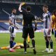 darnell-furlong-receives-a-yellow-card-vs-everton