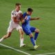 Tsimikas in action for Greece