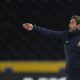 lee-johnson-with-his-arm-outstretched