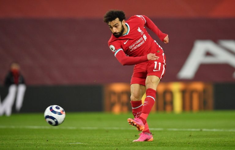 Liverpool's Mohamed Salah takes a shot